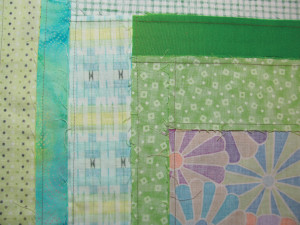 Well-pressed back of quilt top. Threads trimmed.